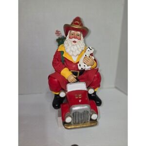 Possible Dreams Clothtique Firefighter Santa on fire truck with Dalmatian